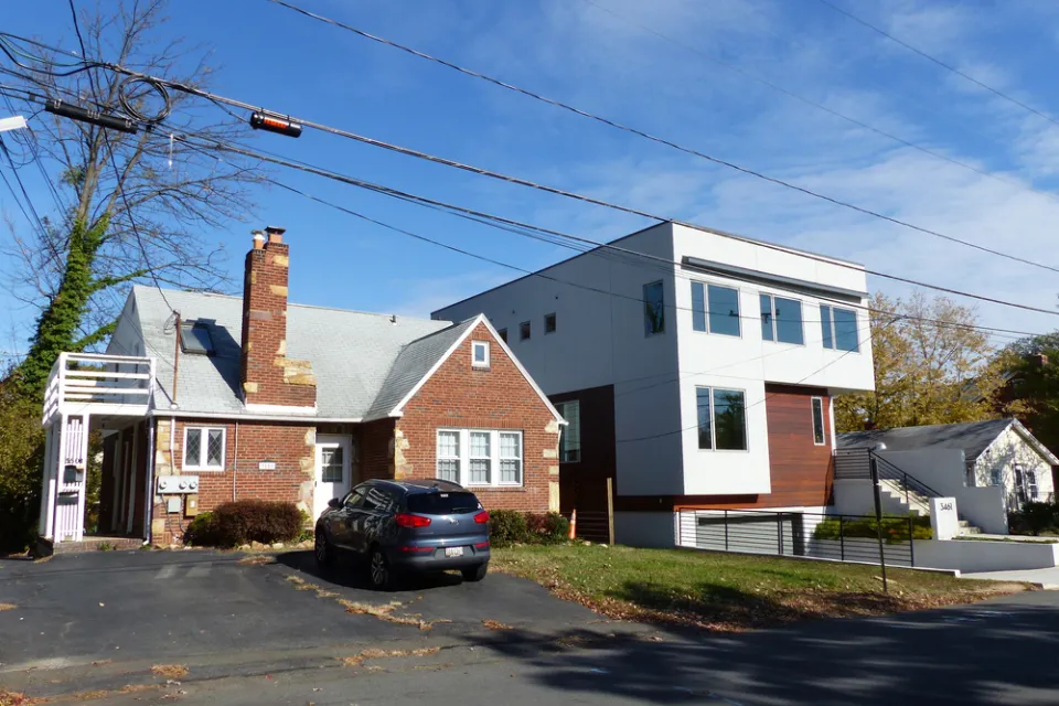 Traditional single-family home next to modern home in Arlington, Virginia
